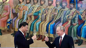 Chinese President Xi Jinping and Russian President Vladimir Putin toast during a dinner at The Palace of the Facets, a building in the Moscow Kremlin, on March 21, 2023.